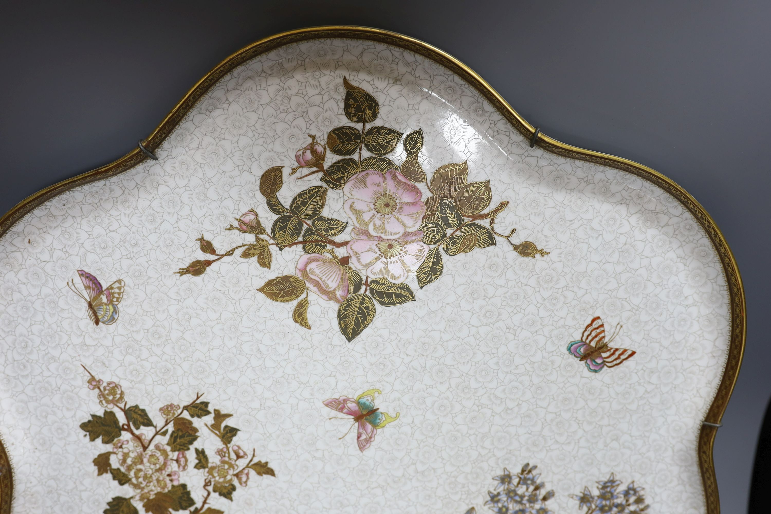 A Royal Worcester Aesthetic period shaped tray, decorated with butterflies and flowers. 50cm